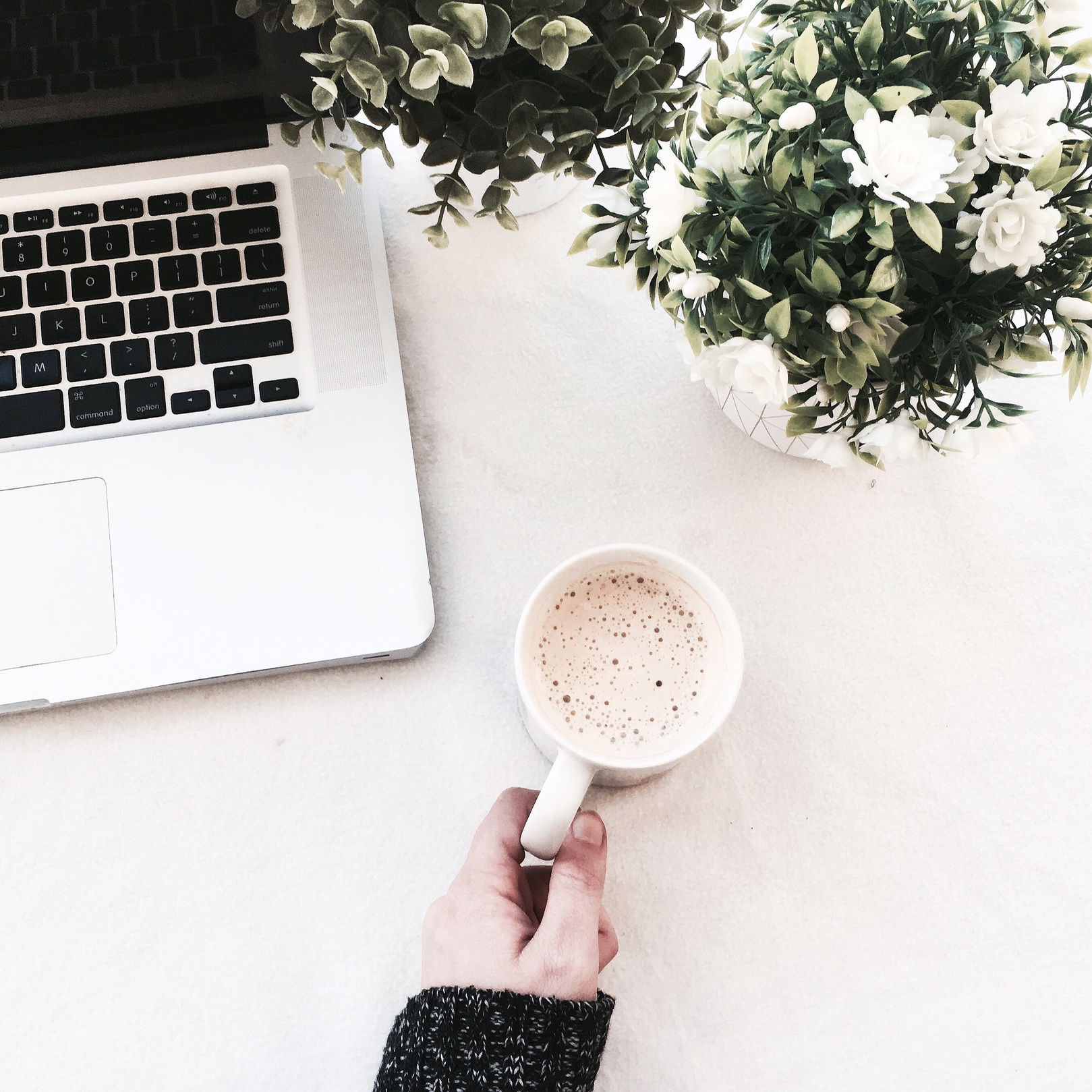 Person Holding Cup of Coffee